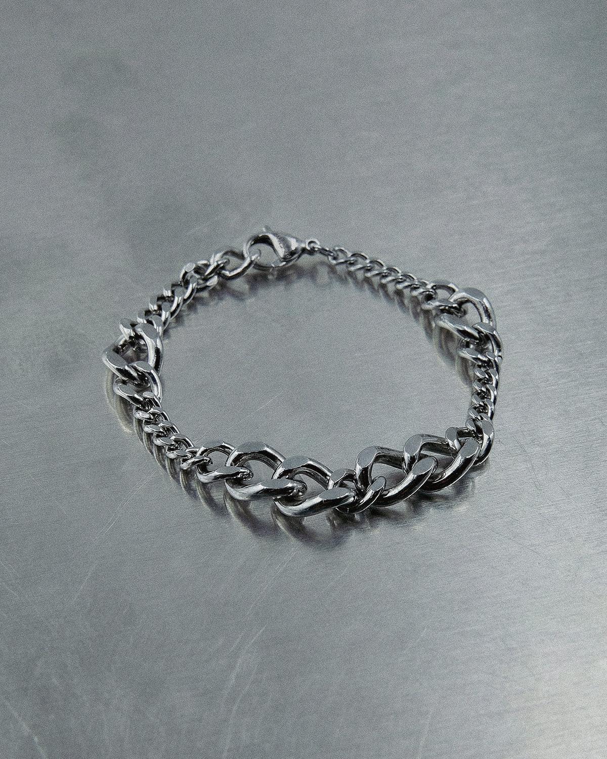 POEMIC Tonal Bracelet top view shot on a metal surface.