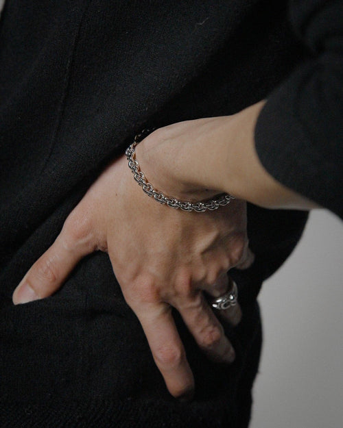 POEMIC Lucid Thick Bracelet shown on model. Sweat-proof sterling silver designed to be never taken off.