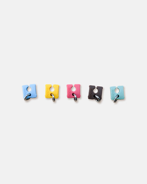 The five coloured silicone clips from Kiki's Clip Set in a row